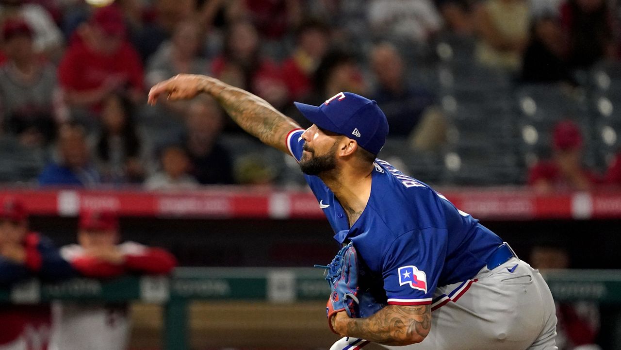 Texas Rangers relief pitcher Matt Bush throws to the plate during the ninth inning of a baseball game against the Los Angeles Angels Friday, July 29, 2022, in Anaheim, Calif. (AP Photo/Mark J. Terri