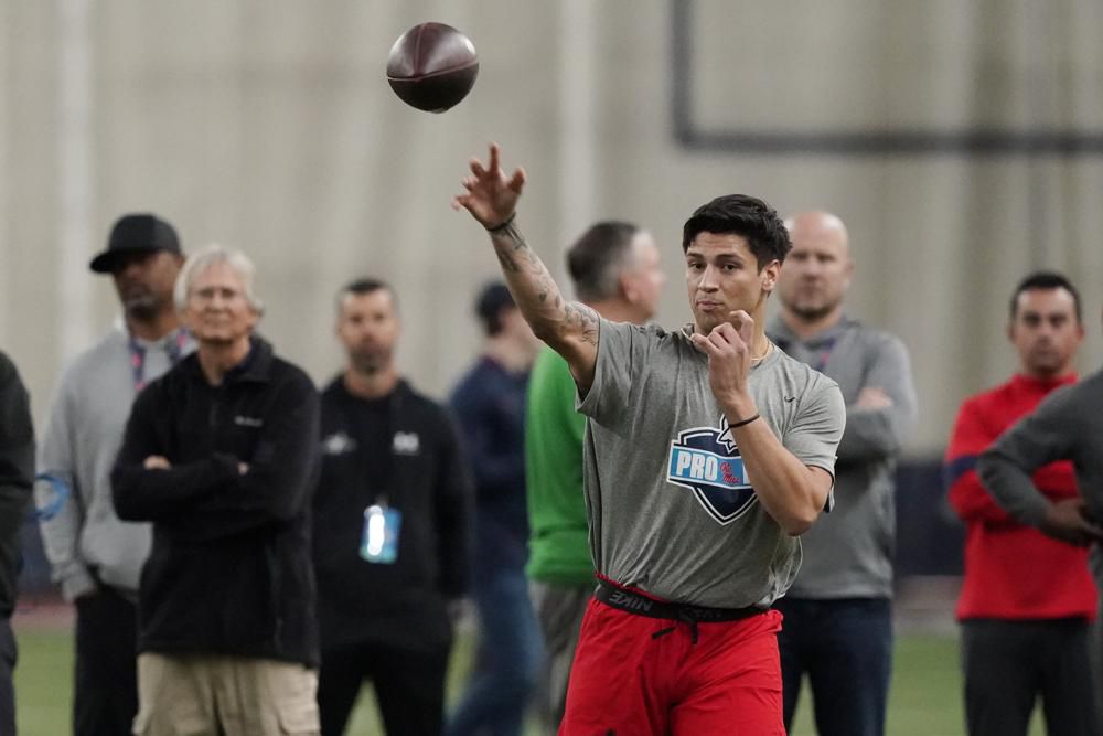 Carolina Panthers quarterback Matt Corral (2) looks over the defense during  an NFL preseason football game against the New York Jets, Saturday, Aug.  12, 2023, in Charlotte, N.C. (AP Photo/Brian Westerholt Stock