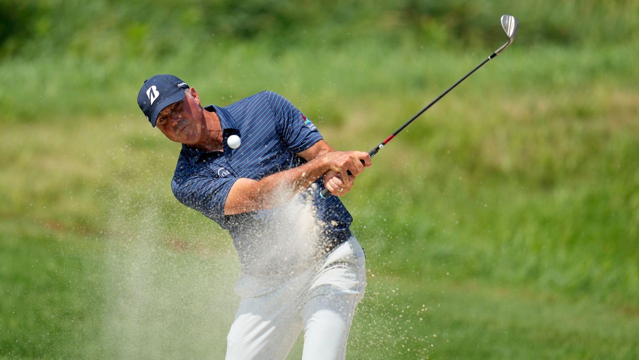 Matt Kuchar hits out of a bunker on the fourth green during the final round of the 3M Open golf tournament at the Tournament Players Club on Sunday, July 28, 2024, in Blaine, Minn. (AP File Photo/Charlie Neibergall)