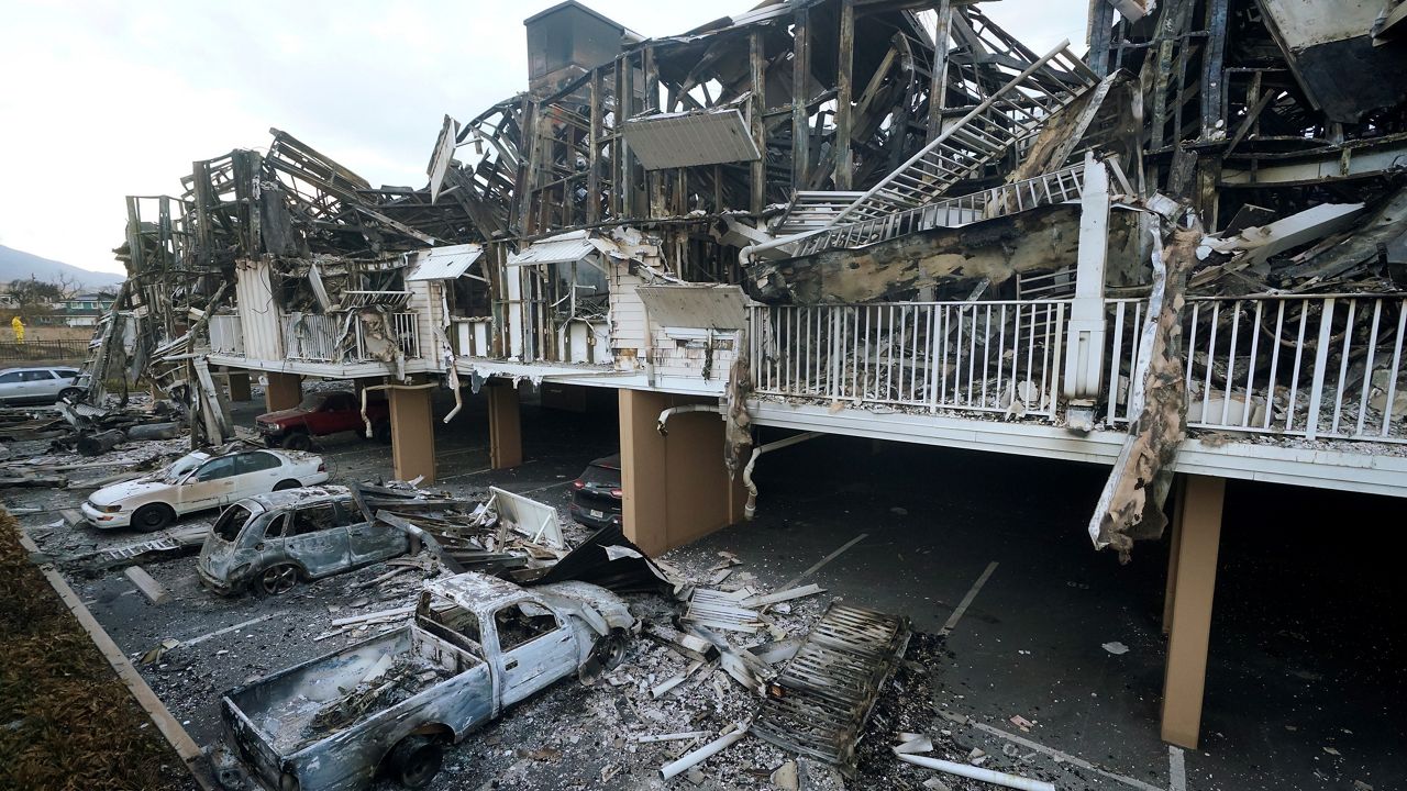 Wildfire damage is shown, Friday, Aug. 11, 2023, in Lahaina, Hawaii. (AP Photo/Rick Bowmer, File)