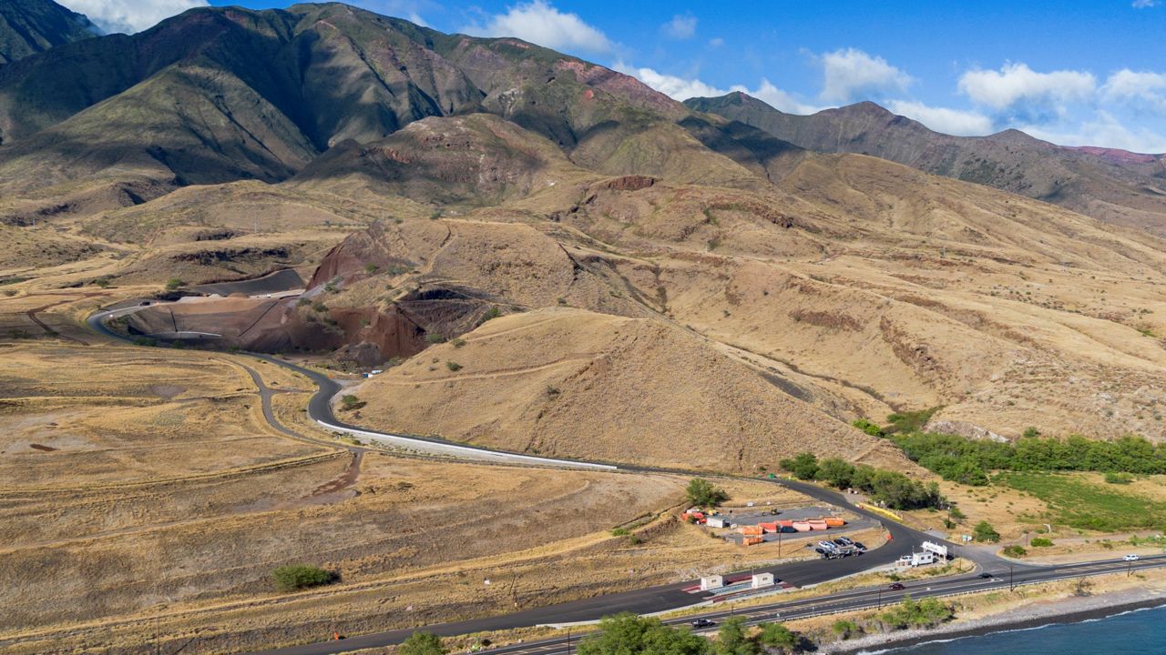 Olowalu temporary landfill site for the debris from the Lahaina fire is seen on Sunday, July 7, 2024, in Lahaina, Hawaii. (AP Photo/Mengshin Lin)