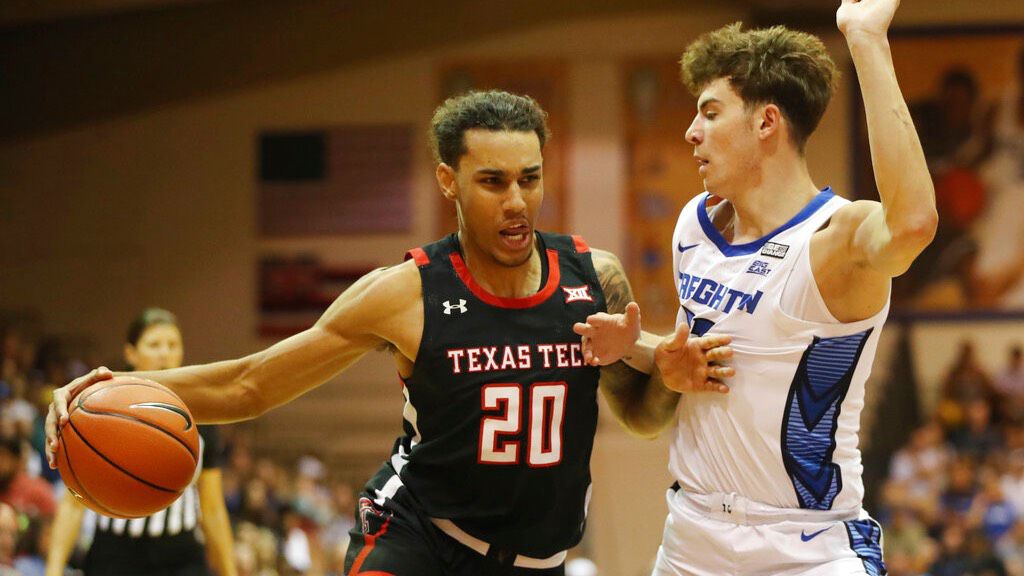 Texas Tech guard Jaylon Tyson tried to get around Creighton forward Mason Miller on Day 1 of the Maui Jim Maui Invitational.