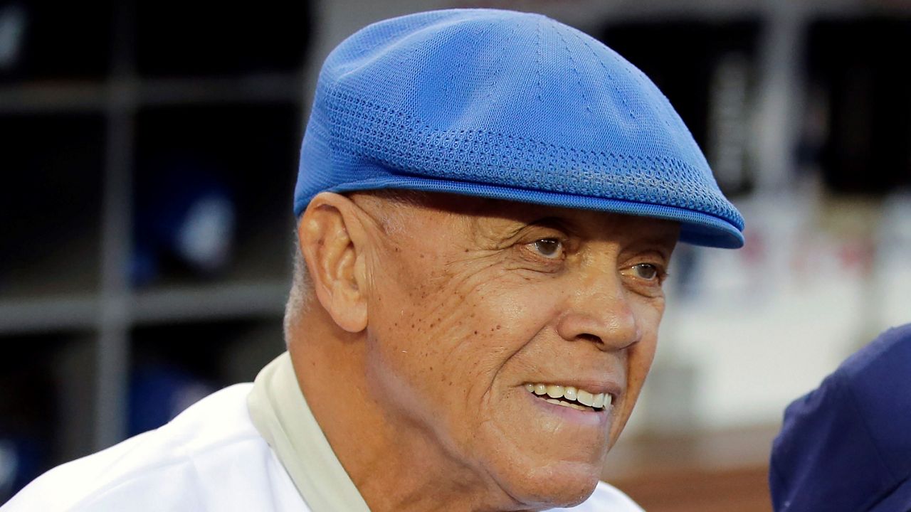 Former Los Angeles Dodgers shortstop Maury Wills is shown before Game 2 of baseball's NL Division Series between the Dodgers and the St. Louis Cardinals in Los Angeles, Saturday, Oct. 4, 2014. (AP Photo/Jae C. Hong, File)