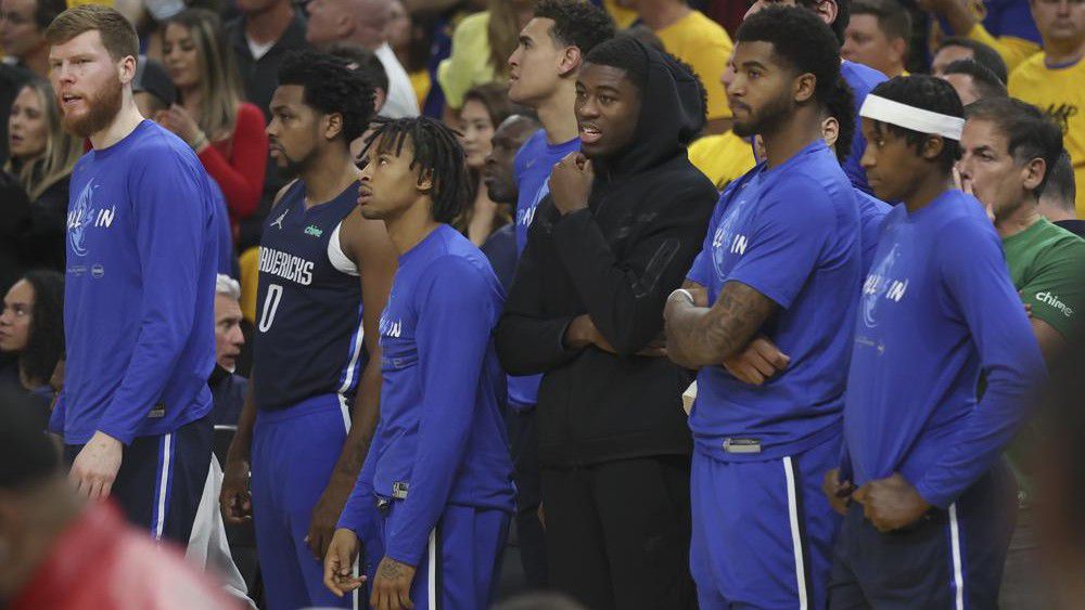Dallas Mavericks players watch from the bench area during the second half of Game 2 of the NBA basketball playoffs Western Conference finals against the Golden State Warriors in San Francisco, Friday, May 20, 2022. (AP Photo/Jed Jacobsohn)