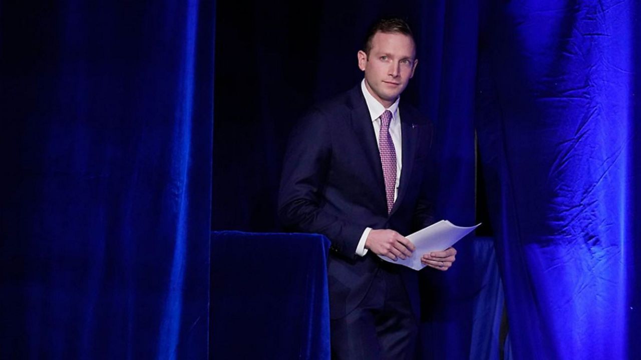 Rep.-elect Max Miller, R-Ohio, walks on stage before speaking at an annual leadership meeting of the Republican Jewish Coalition Saturday, Nov. 19, 2022, in Las Vegas.