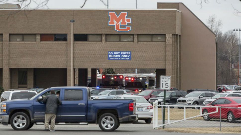 Emergency crews respond to Marshall County High School after a fatal shooting Tuesday, Jan. 23, 2018, in Benton, Ky. Authorities said a shooting suspect was in custody. (Ryan Hermens/The Paducah Sun via AP)