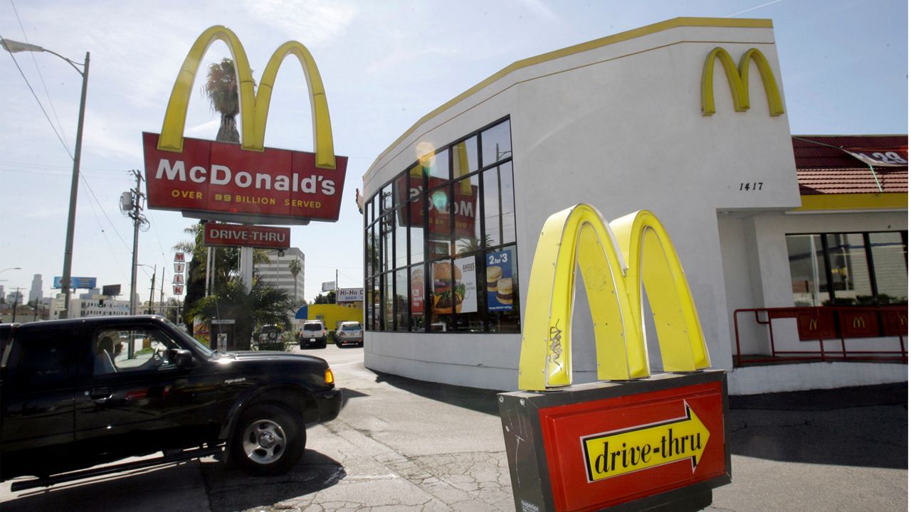 In this March 10, 2008 file photo, a vehicle turns into the driveway of a McDonald's restaurant in Los Angeles. (AP Photo/Nick Ut, File)