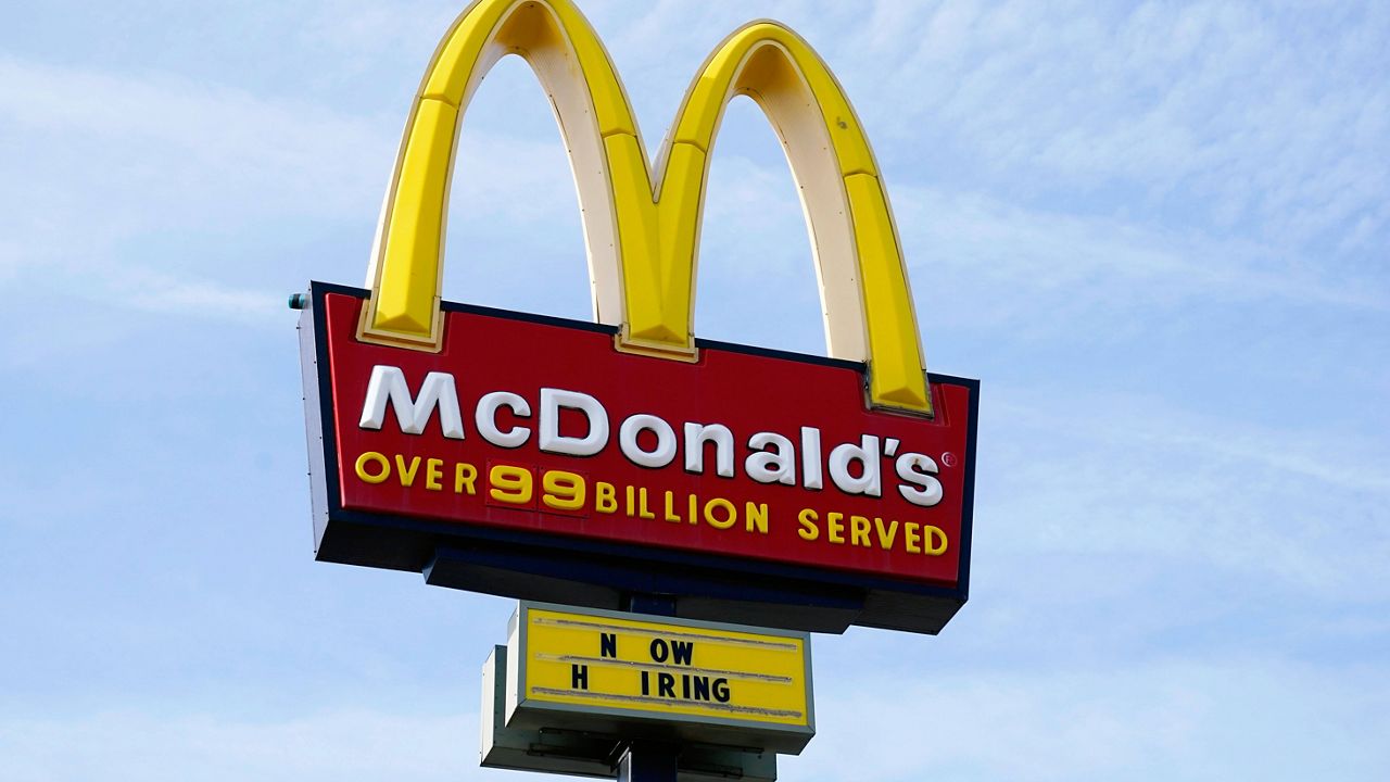 A sign is displayed outside a McDonald's restaurant in Des Moines, Iowa. (AP Photo/Charlie Neibergall, File)
