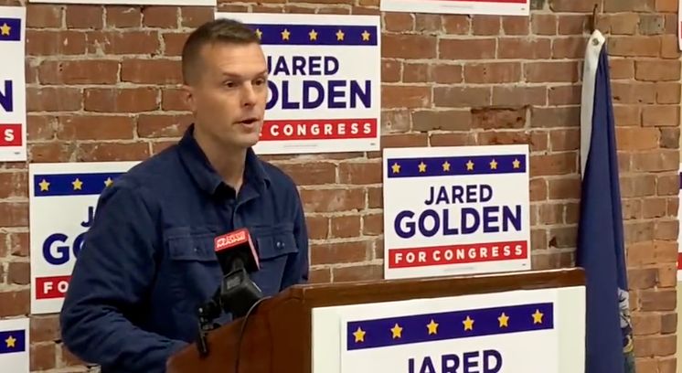 Jared Golden declares victory Thursday in Lewiston in his race for re-election to Maine's 2nd District House seat. David Singer / Spectrum News Maine