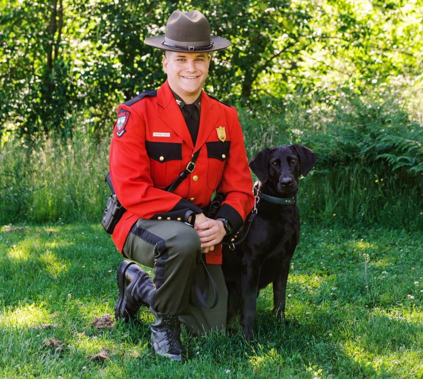 Maine Game Warden Michael Latti and Warden K9 Luna. Image courtesy Maine Inland Fish and Wildlife