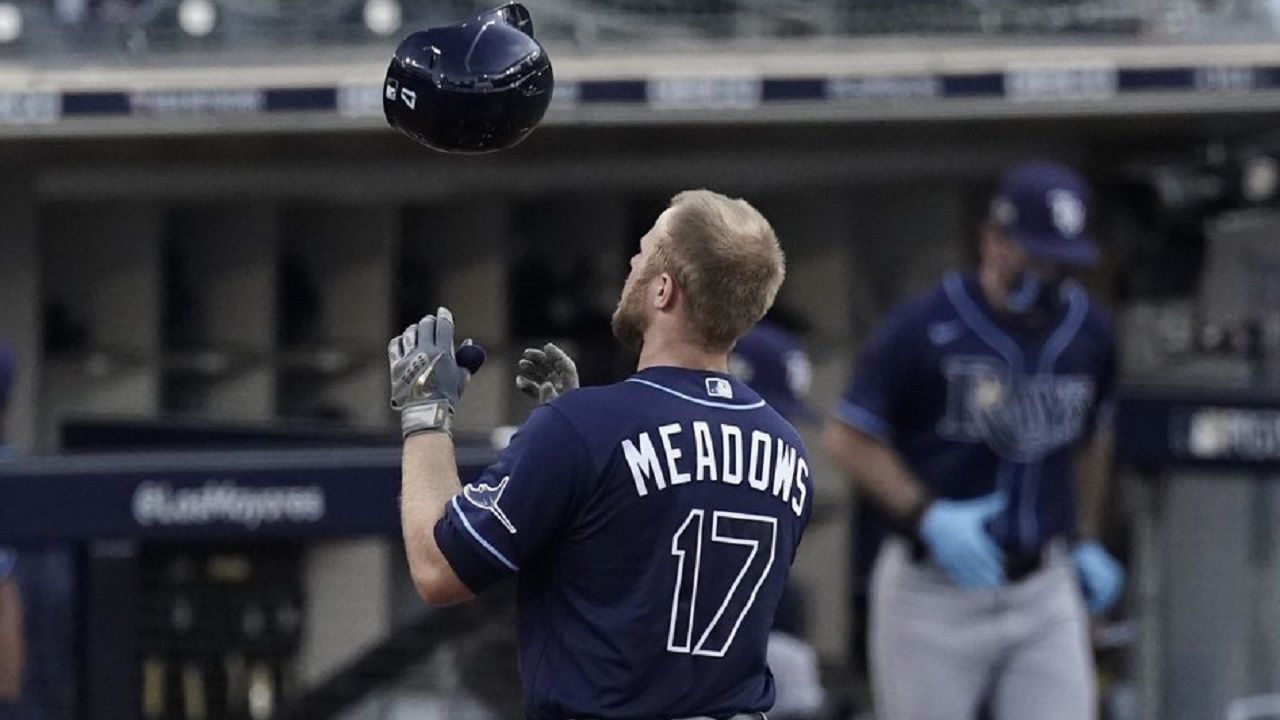 Tampa Bay Rays' Austin Meadows tosses his helmet after flying out during the ninth inning in Game 5 of a baseball American League Championship Series against the Houston Astros, Thursday, Oct. 15, 2020, in San Diego. (AP Photo/Jae C. Hong)