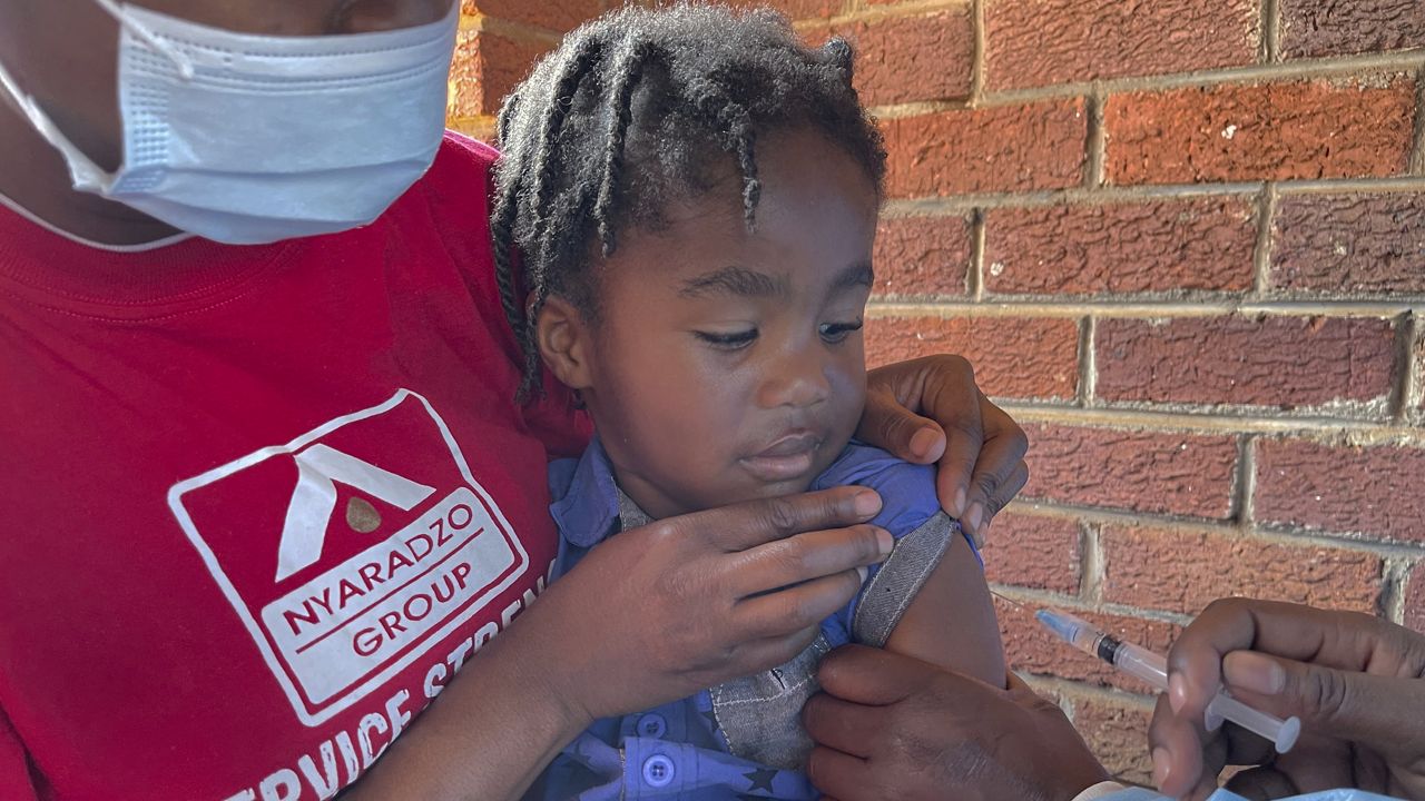 A child receives a measles vaccination shot at a local clinic in Harare, Zimbabwe, on Sept. 6, 2022. (AP Photo/Tsvangirayi Mukwazhi, File)
