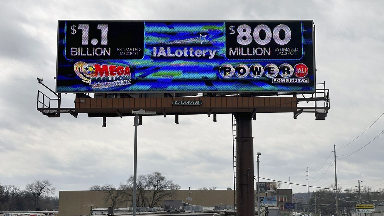 An electronic billboard advertises the Mega Millions and Powerball jackpots, Monday, March 25, 2024, in in Des Moines, Iowa. (AP Photo/Scott McFetridge, File)