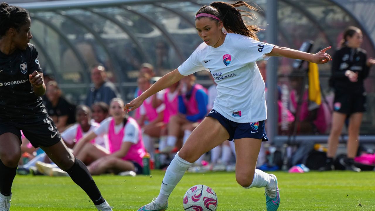 In this handout image provided by San Diego Wave FC, San Diego Wave forward Melanie Barcenas controls the ball during a preseason soccer match against Angel City FC Saturday, March 18, 2023, in San Diego. (San Diego Wave FC via AP)