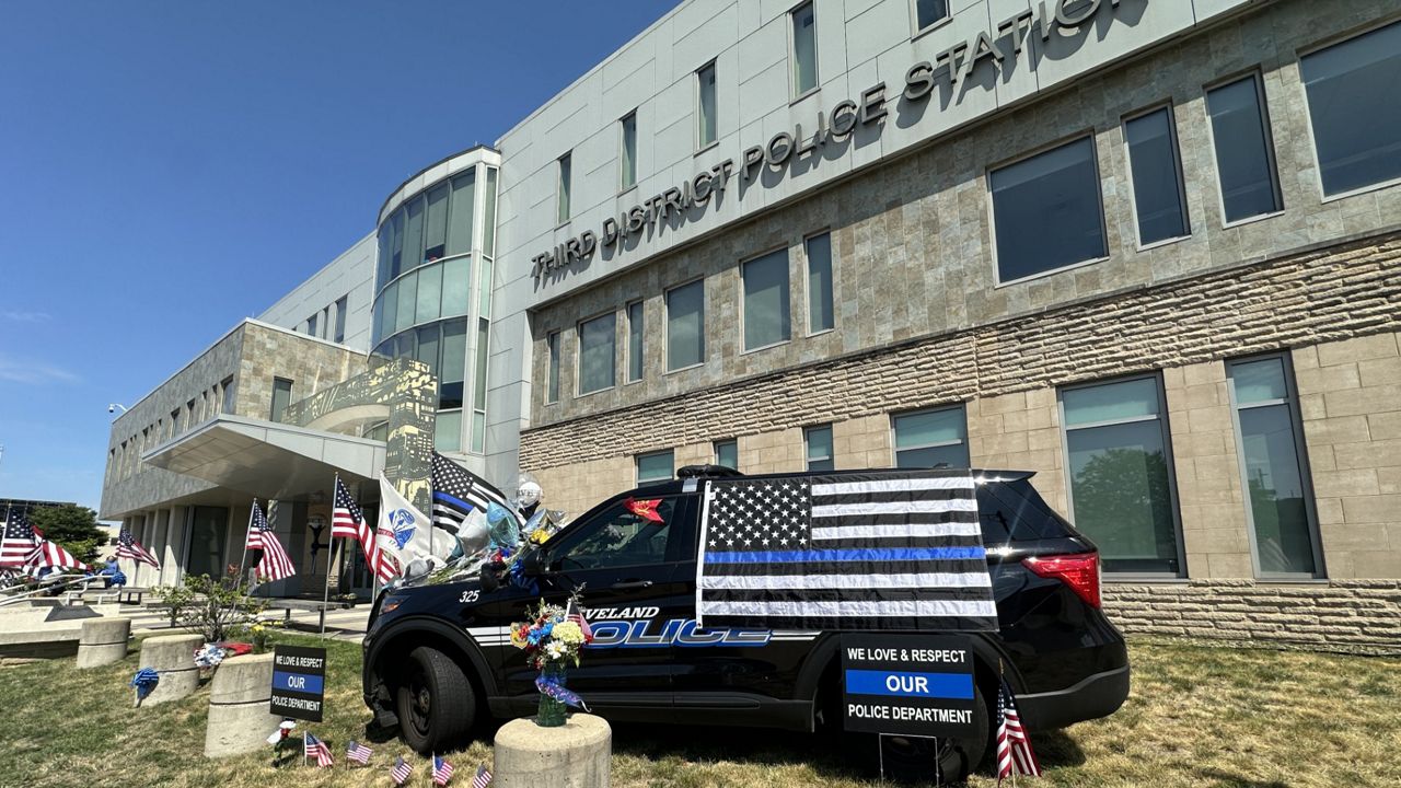 The memorial outside the Third District Police Station in Cleveland for fallen officer Jamieson Ritter. 