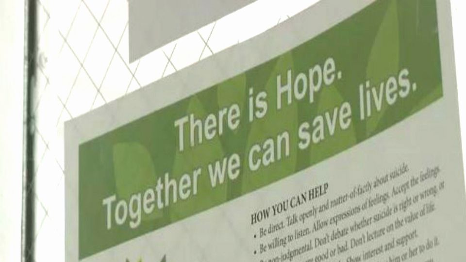A poster reads "There is Hope. Together we can save lives." (File image)