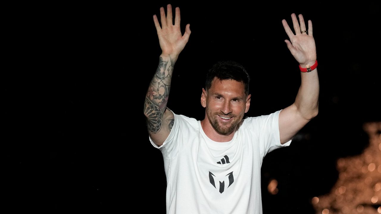 Inter Miami's Lionel Messi waves to fans as he is introduced during a celebration by the team at DRV PNK Stadium, Sunday, July 16, 2023, in Fort Lauderdale, Fla. (AP Photo/Rebecca Blackwell)