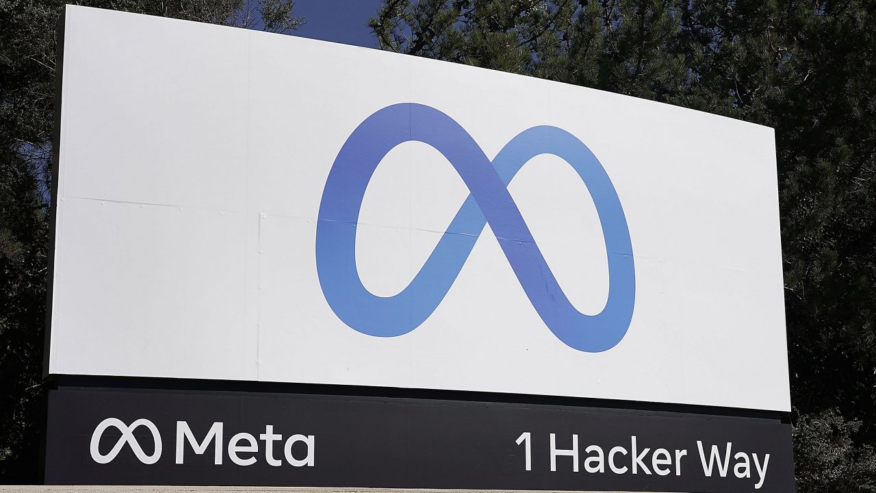 Facebook's Meta logo sign is seen at the company headquarters in Menlo Park, Calif. (AP Photo/Tony Avelar, File)