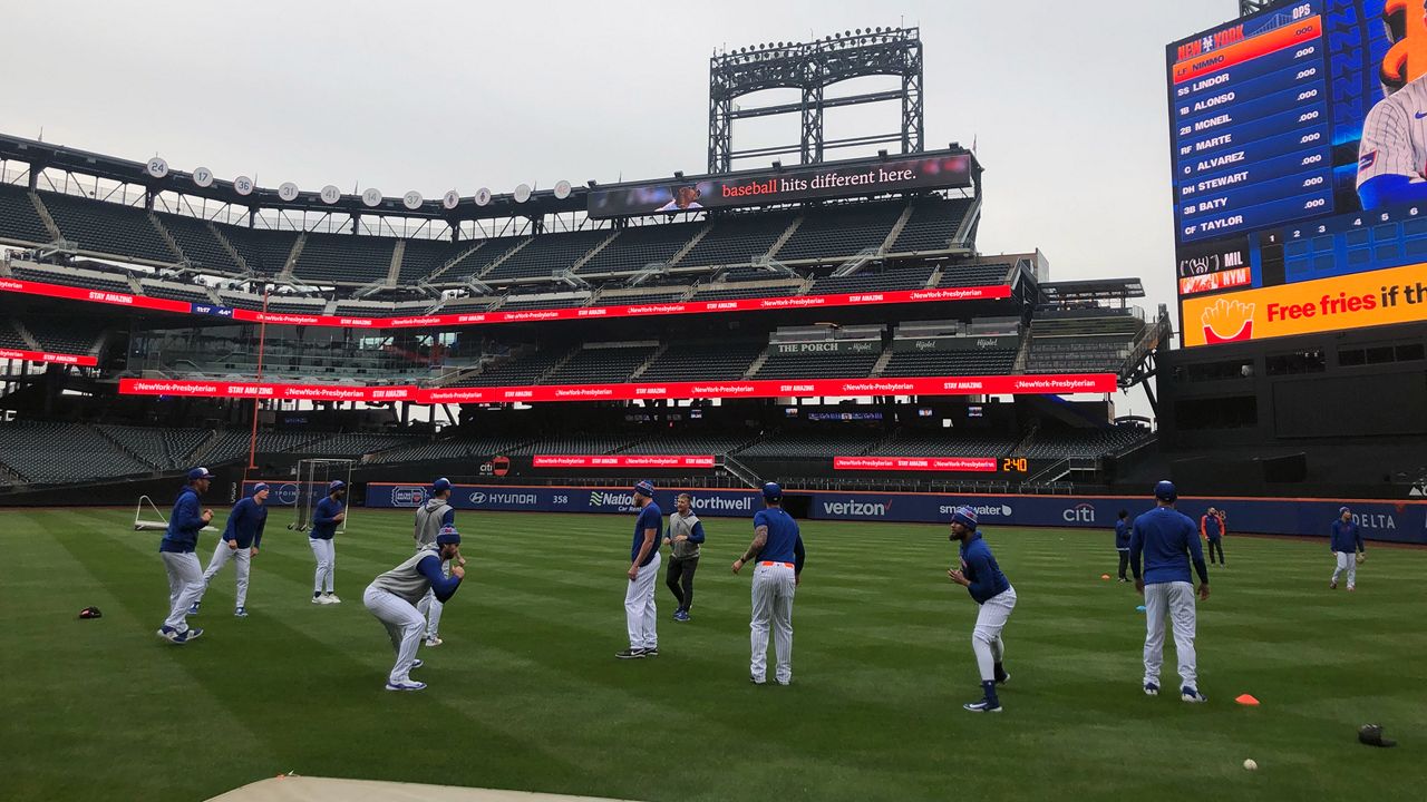 A photo of the Mets conducting a team workout at Citi Field.