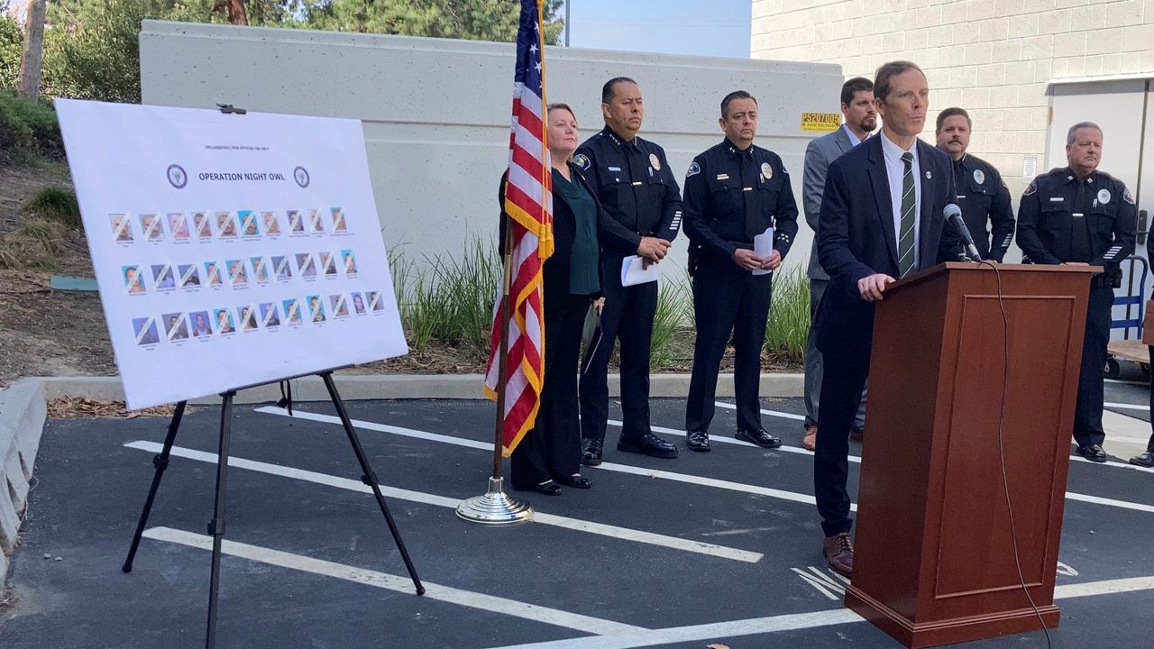 Brian Gilhooly, FBI special agent in charge, speaks about a sweeping racketeering case against the Mexican Mafia during a news conference in Orange, Calif., on Wednesday. (AP Photo/Amy Taxin)