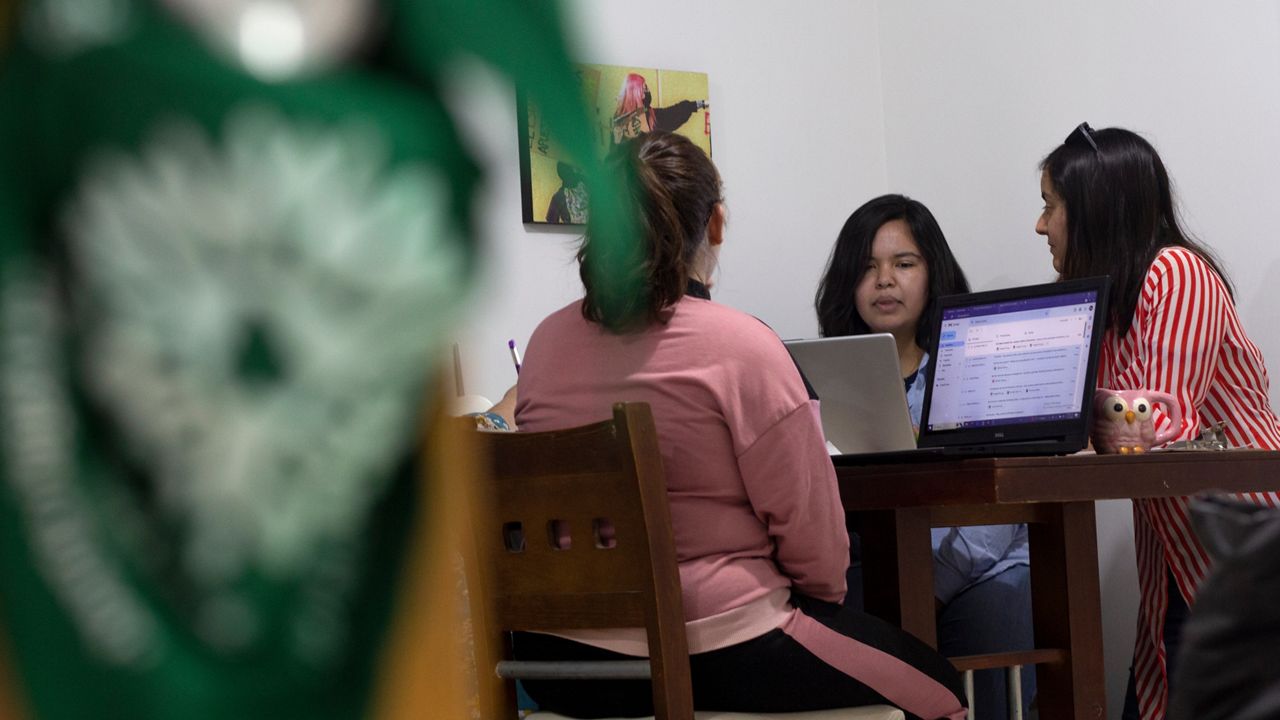 Members of the Marea Verde Chihuahua collective meet at their headquarters in Chihuahua, Mexico, Monday, March 13, 2023. The organization of volunteers has supported reproductive rights in northern Mexico since 2018, providing virtual guidance as well as shipments of abortion pills for women who want to terminate a pregnancy on their own, sparking requests from the U.S. after the Supreme Court eliminate the constitutional right to abortion in 2022. (AP Photo/Adriana Esquivel)