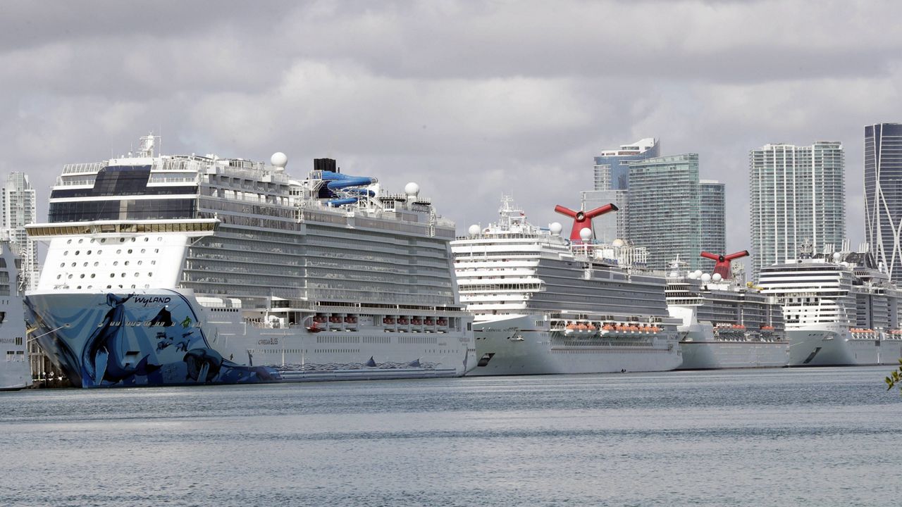In this March 31, 2020, file photo, cruise ships are docked at PortMiami in Miami. (AP Photo/Wilfredo Lee, File)