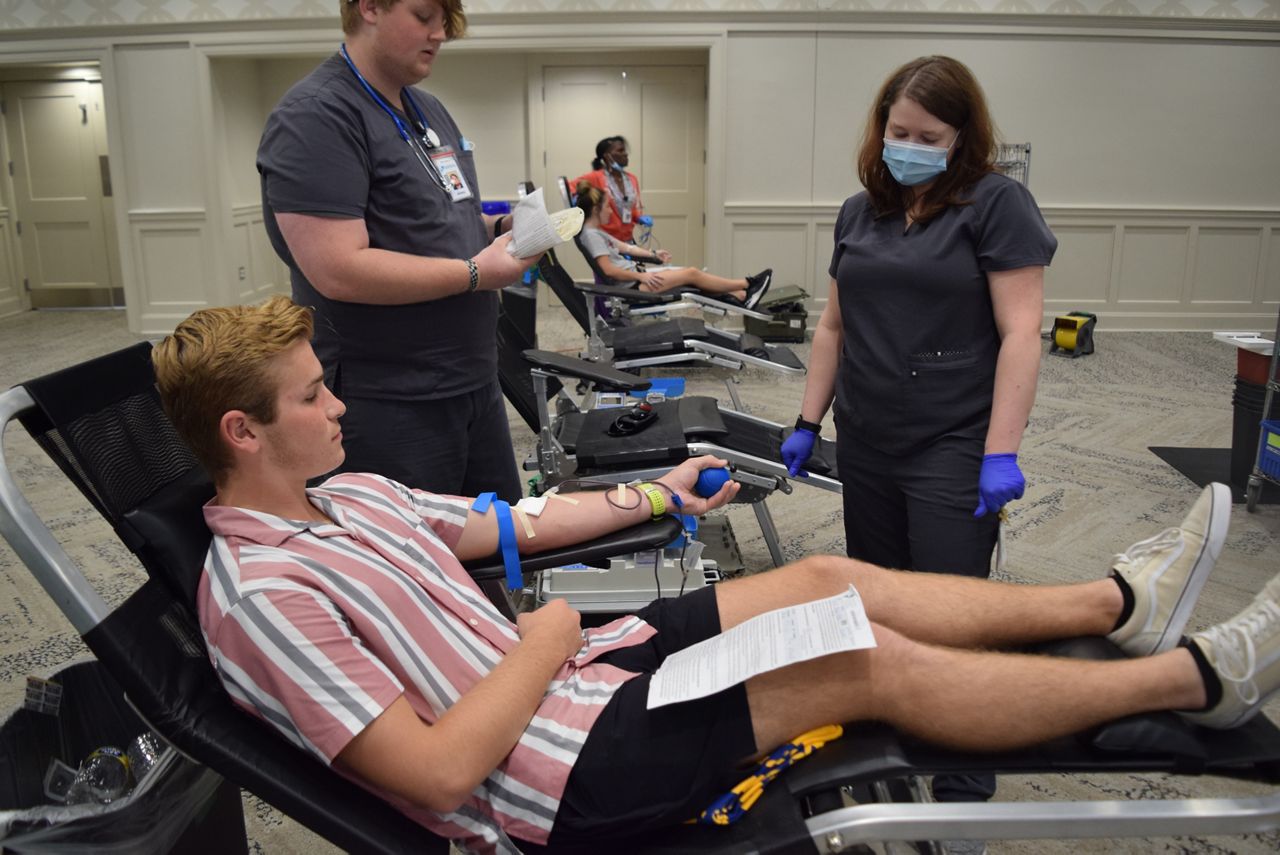 Miami University student Ben Malek donates blood during a Community Blood Center event on the Oxford, Ohio, campus. (Photo courtesy of Community Blood Center)