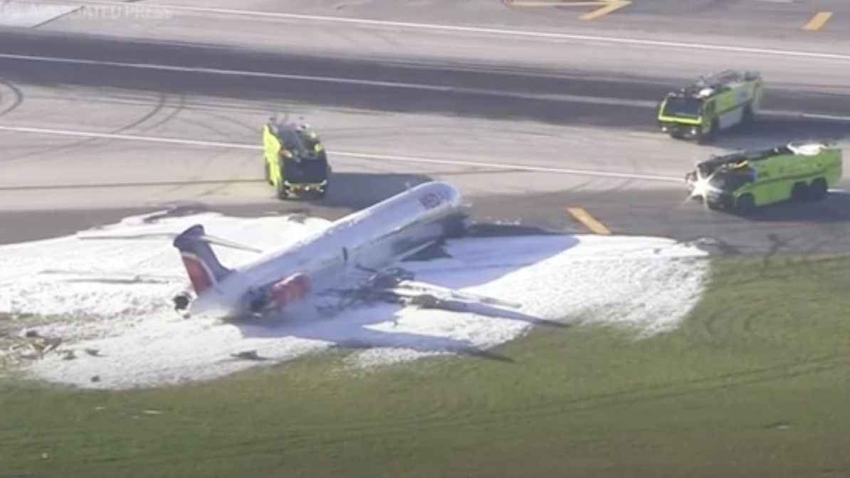 A plane caught fire in Miami Tuesday after the landing gear failed