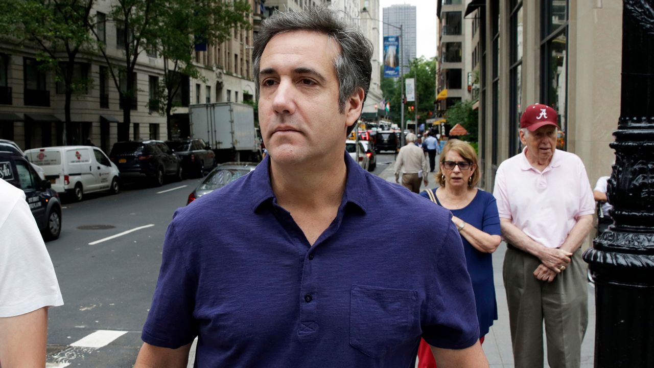 In a Monday, July 30, 2018 file photo, Michael Cohen, formerly a lawyer for President Trump, leaves his hotel, in New York. 