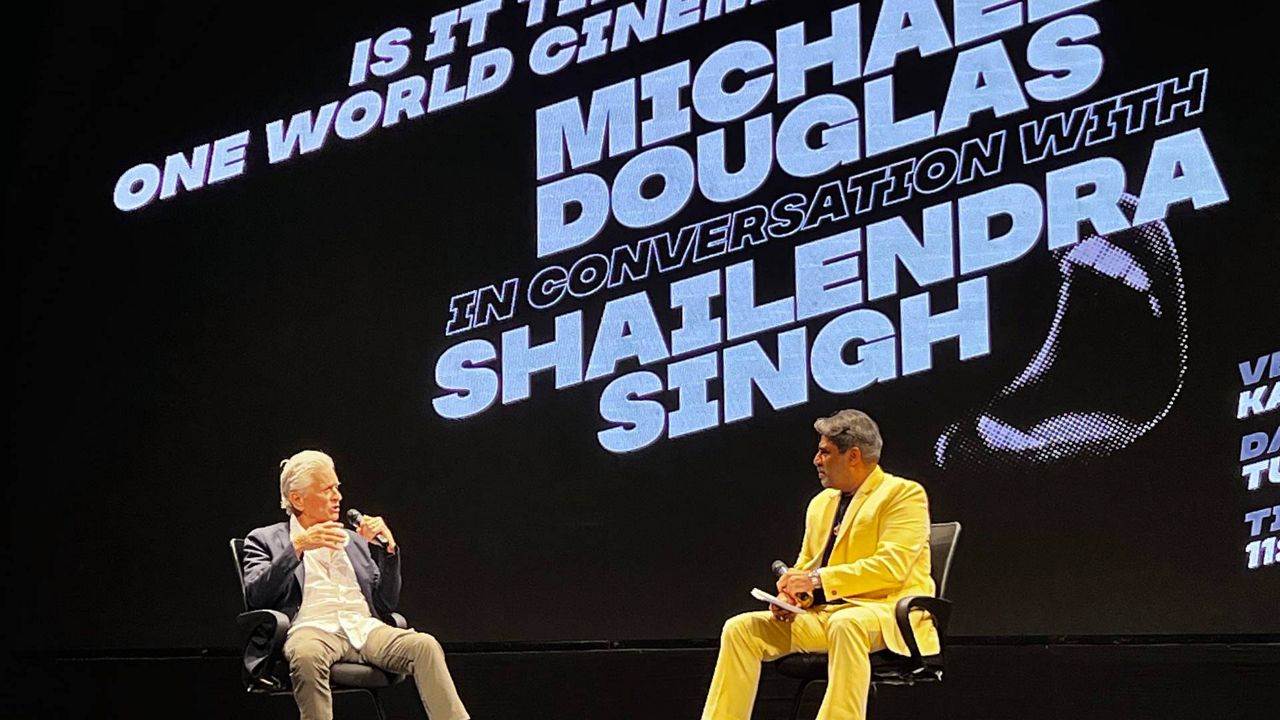 Hollywood actor and producer Michael Douglas speaks with Indian film producer Shailendra Singh at a session on the last day of the 54th International Film Festival of India, in Goa, India, on Tuesday. (AP Photo/Vineeta Deepak)