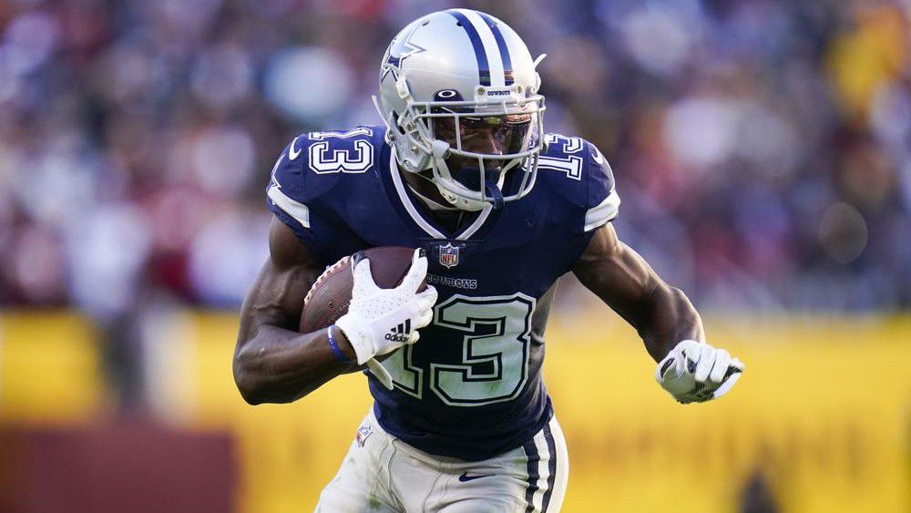 FILE - Dallas Cowboys wide receiver Michael Gallup catches a pass against the Washington Football Team during the second half of an NFL football game Dec. 12, 2021, in Landover, Md. The Cowboys agreed on a long-term contract with Gallup a day after trading Amari Cooper to Cleveland. Gallup is returning on a $62.5 million, five-year contract, two people with knowledge of the agreement said Sunday, March 13, 2022. The people spoke to The Associated Press on condition of anonymity because the deal cannot be official until the start of the new league year. (AP Photo/Julio Cortez, File)