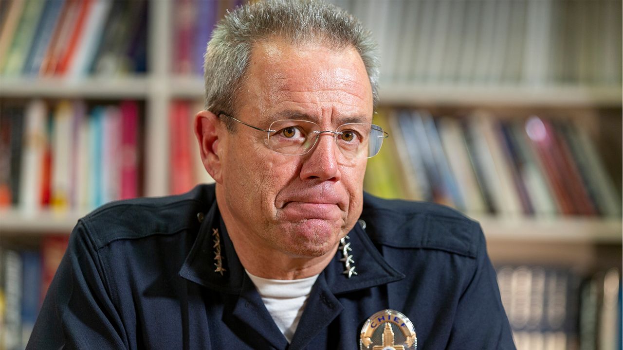 In this Wednesday, July 10, 2019 photo Los Angeles Police Department Chief Michel Moore pauses during an interview with The Associated Press in Los Angeles. (AP Photo/Damian Dovarganes)