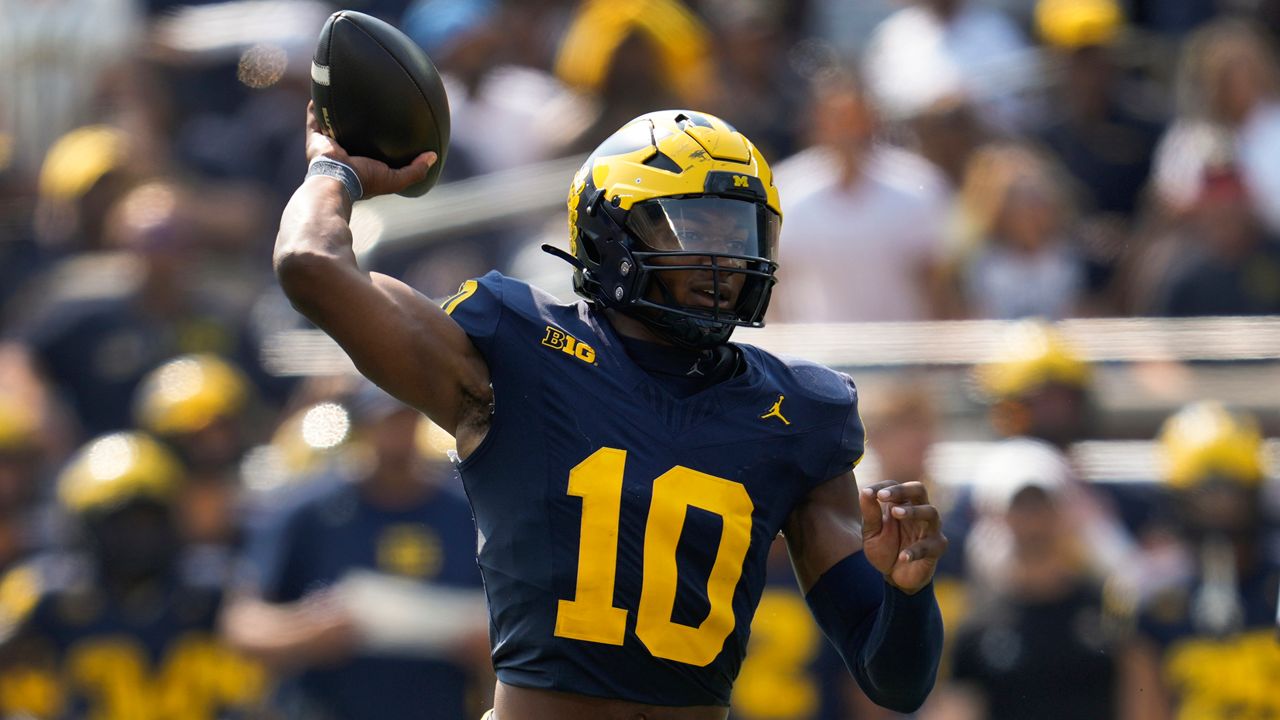 Michigan quarterback Alex Orji (10) throws against Arkansas State in the second half of an NCAA college football game in Ann Arbor, Mich., Saturday, Sept. 14, 2024. (AP Photo/Paul Sancya)