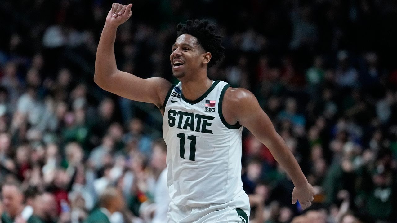 Michigan State guard A.J. Hoggard (11) celebrates in the second half of a first-round college basketball game against Southern California in the men's NCAA Tournament in Columbus, Ohio, Friday, March 17, 2023. Michigan State defeated Southern California 72-62. (AP Photo/Michael Conroy)