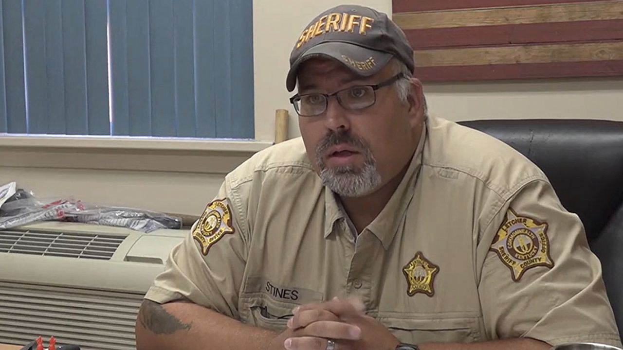 Sheriff charged with murder allegedly ignored deputy's abuse of a woman