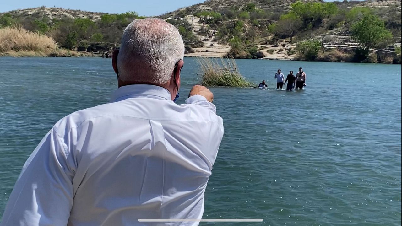 Spectrum News 1 was present during the dramatic rescue of a group of migrants from the Rio Grande, including a child. (Spectrum News 1)