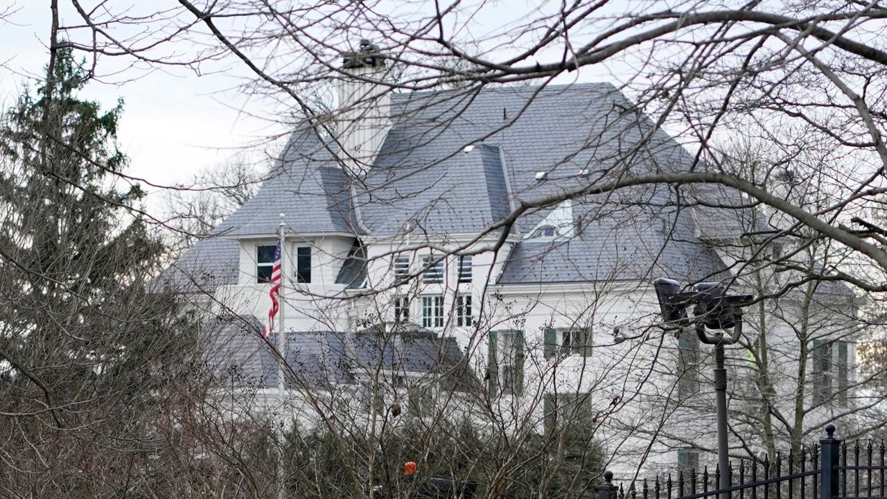 A view of the security around the Vice President's residence at the Naval Observatory in Washington, Jan. 17, 2021. Local organizers in Washington say three buses of recent migrant families arrived from Texas near the home of Vice President Kamala Harris in record-setting cold on Christmas Eve. Texas authorities have not confirmed their involvement. (AP Photo/Susan Walsh, File)