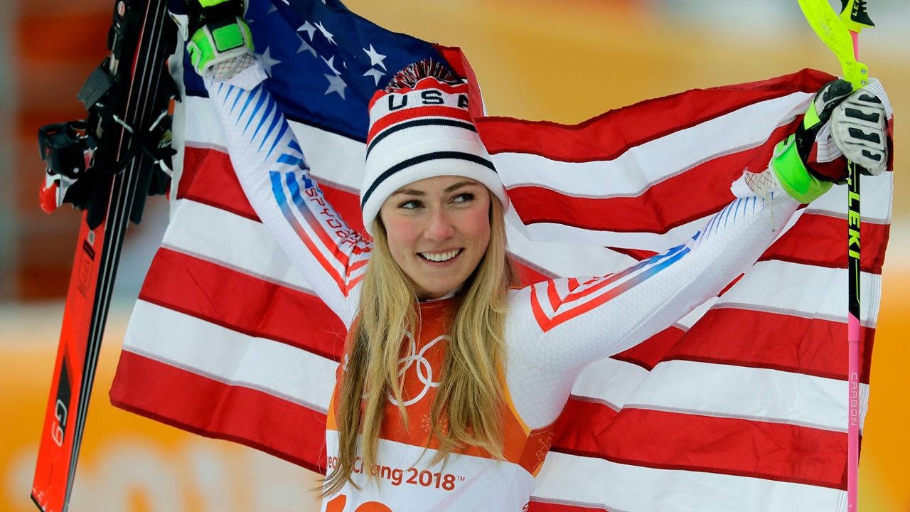  Silver medal winner Mikaela Shiffrin poses during the flower ceremony for the women's combined at the 2018 Winter Olympics. (AP Photo/Michael Probst, File)