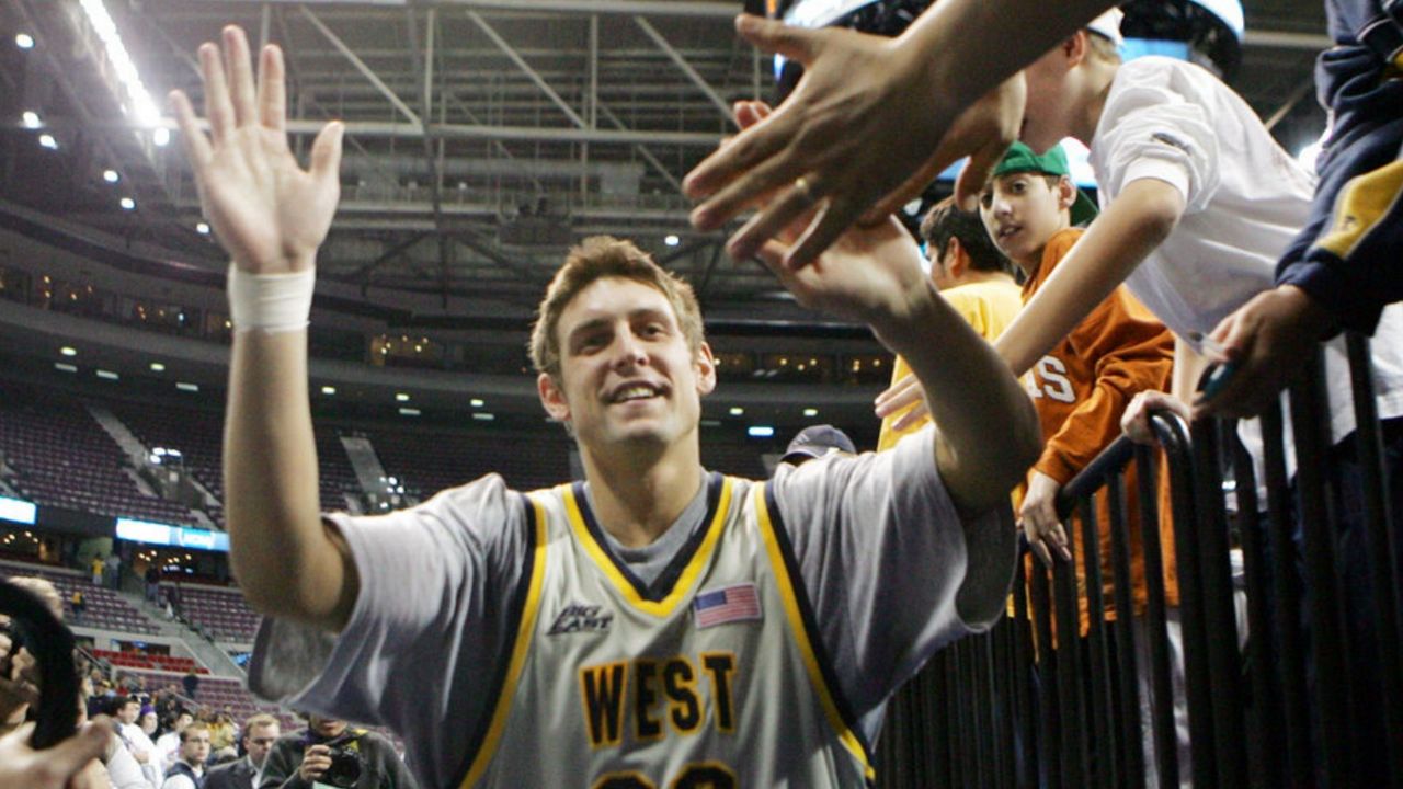 West Virginia forward Mike Gansey celebrates a 67-54 win over Northwestern State in the second round of the NCAA college basketball tournament, Sunday, March 19, 2006, in Auburn Hills, Mich. (AP Photo/David Duprey)