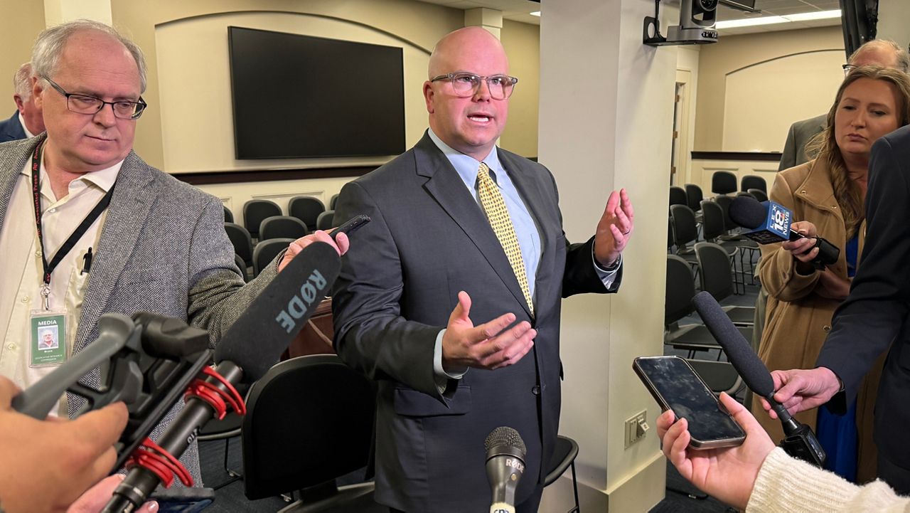 Michael Abate, general council for the Kentucky Press Association, speaks to reporters after a Senate committee passed House Bill 509 (Spectrum News 1/Mason Brighton)