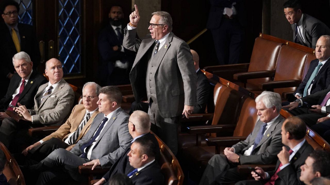 Rep. Mike Bost, R-Ill., stands and yells at Rep. Matt Gaetz, R-Fla., as he nominates Rep. Jim Jordan, R-Ohio, for speaker ahead of the 12th round of voting in the House chamber as the House meets for the fourth day to elect a speaker and convene the 118th Congress in Washington, Friday, Jan. 6, 2023. (AP Photo/Andrew Harnik)