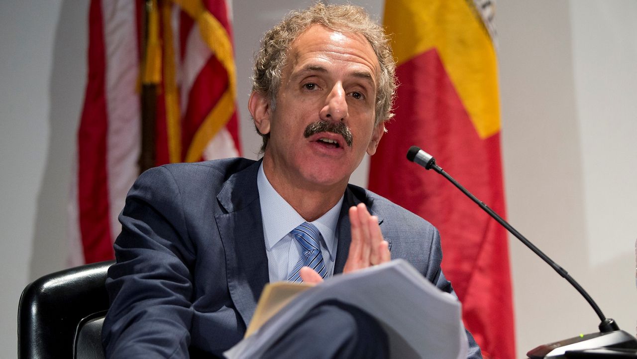 In this May 30, 2019, file photo, Los Angeles City Attorney Mike Feuer speaks at Los Angeles Police Headquarters. (AP Photo/Damian Dovarganes)