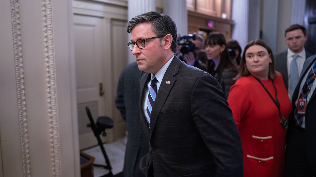 House Speaker Mike Johnson, R-La., enters the House chamber as lawmakers prepare to vote on the articles of impeachment against Homeland Security Secretary Alejandro Mayorkas for failures on the U.S.- Mexico border at the Capitol in Washington, Tuesday, Feb. 6, 2024. (AP Photo/J. Scott Applewhite)