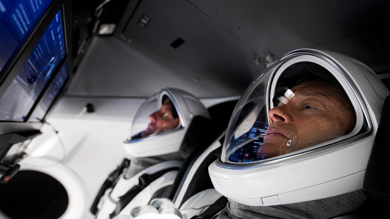 Axiom-1 mission commander Michael López-Alegría (right) and pilot Larry Connor (left) train in a Crew Dragon simulation ahead of the Ax-1 mission launch. NASA announced a delay in the launch due to the wet dress rehearsal test for the Space Launch System (SLS) rocket. (Axiom Space)