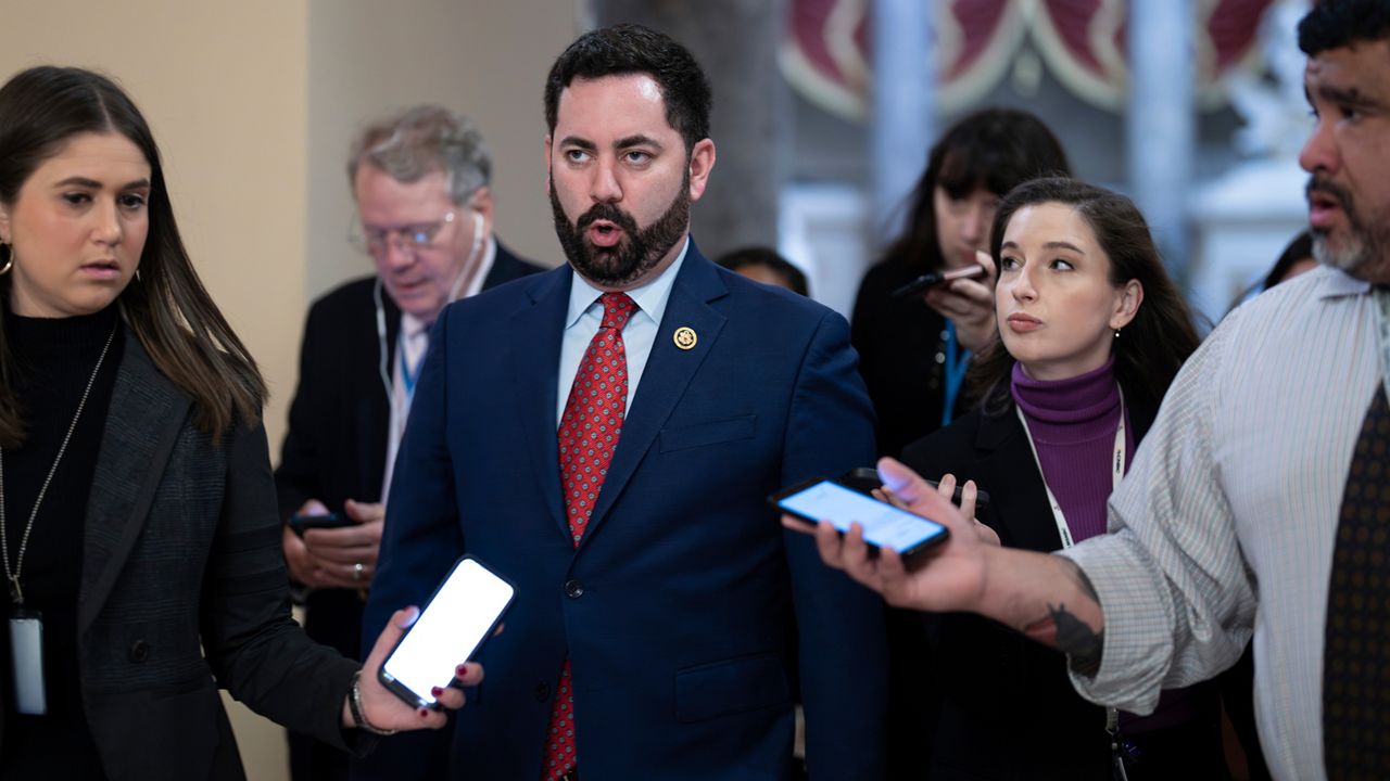 Rep. Mike Lawler, R-N.Y., walks with reporters on his way to the chamber for final votes of the week, at the Capitol in Washington, Friday, Jan. 12, 2024. (AP Photo/J. Scott Applewhite)