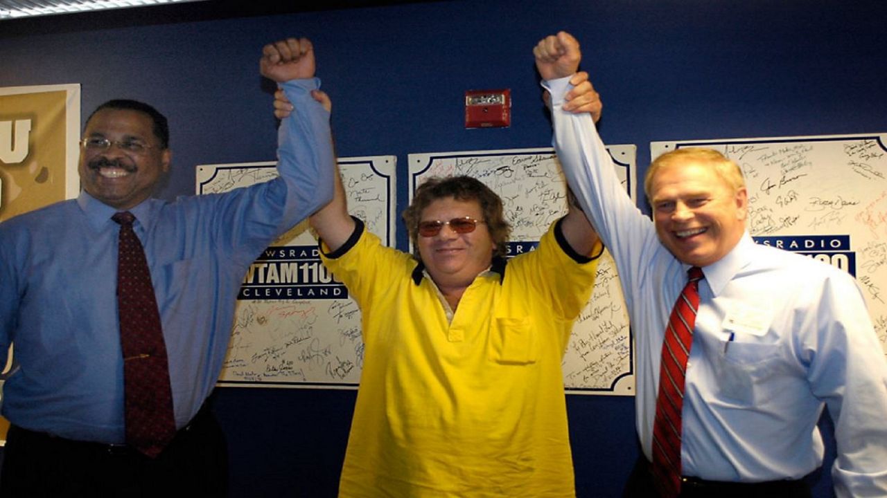 Republican gubernatorial candidate Ken Blackwell, Ohio Secretary of State, left, and Democratic opponent Rep. Ted Strickland, D-Ohio, clown around with Cleveland radio host Mike Trivisonno, center, while posing for a picture during a break in their appearance on Trivisonno's "Non-Debate Forum", which was broadcast live on WTAM Radio in Independence, Ohio, Friday, Oct. 13, 2006. (AP Photo/Jamie-Andrea Yanak)