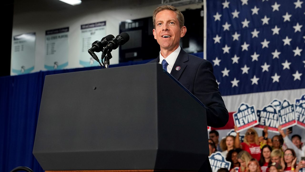 Rep. Mike Levin, D-Calif., speaks ahead of President Joe Biden at a campaign event in support Levin, Thursday, Nov. 3, 2022, in San Diego. (AP Photo/Patrick Semansky)