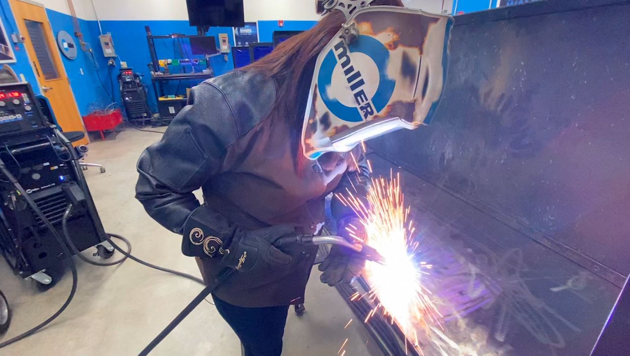 Valarie Schwartz welds at Miller Electric in Appleton, Wisconsin.
