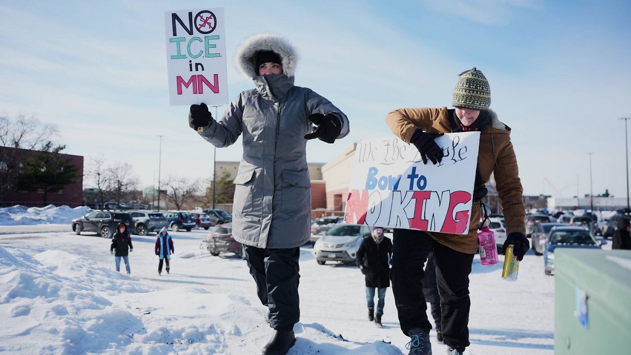 Police arrest protesters at airport as Minnesota gears up for anti-immigration enforcement demonstration