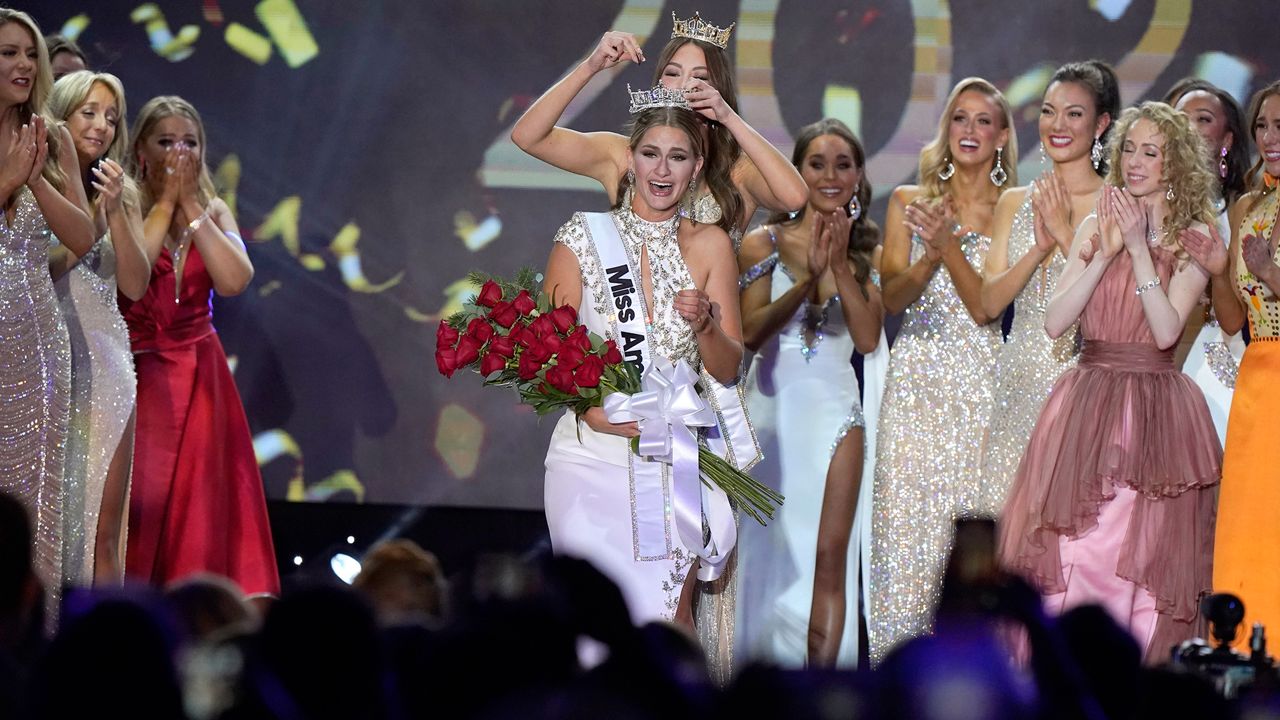 Miss Wisconsin 2022 Grace Stanke, center, is crowned as Miss America 2023 by Miss America 2022 Emma Broyles, behind center, at the conclusion of the 2023 Miss America competition at the Mohegan Sun casino, in Uncasville, Conn., Thursday, Dec. 15, 2022. (AP Photo/Steven Senne)